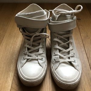 White Converse high tops
